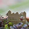 Climb The Fence Dog Puppy Figurine